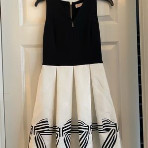 Ted Baker London, Size one, pleated, zipper, white bodice with bow hem.